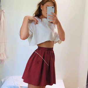 Pleated orange skirt